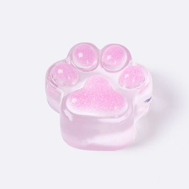 Glitter Clear fuchsia Paw Taba Squishy – Clear pink glitter paw-shaped squishy toy with five raised pads